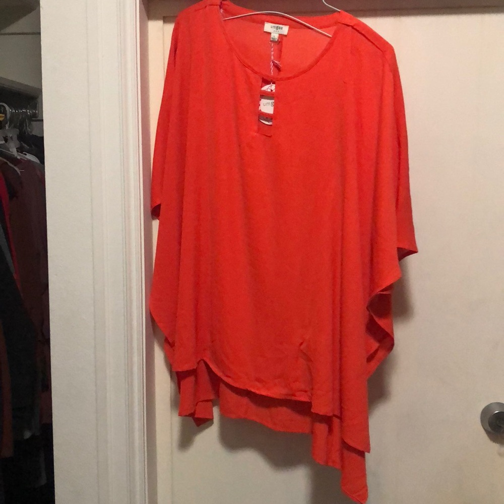 Orange drape sleeve top
